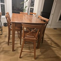 Solid Wood Table And 7 Chairs 