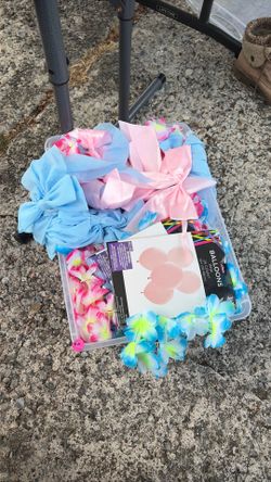 Gender reveal leis and decor