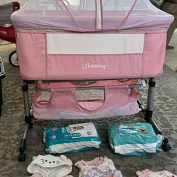 baby girl bassinet like new  and clothes bundle NOT FREE TAKING OFFERS