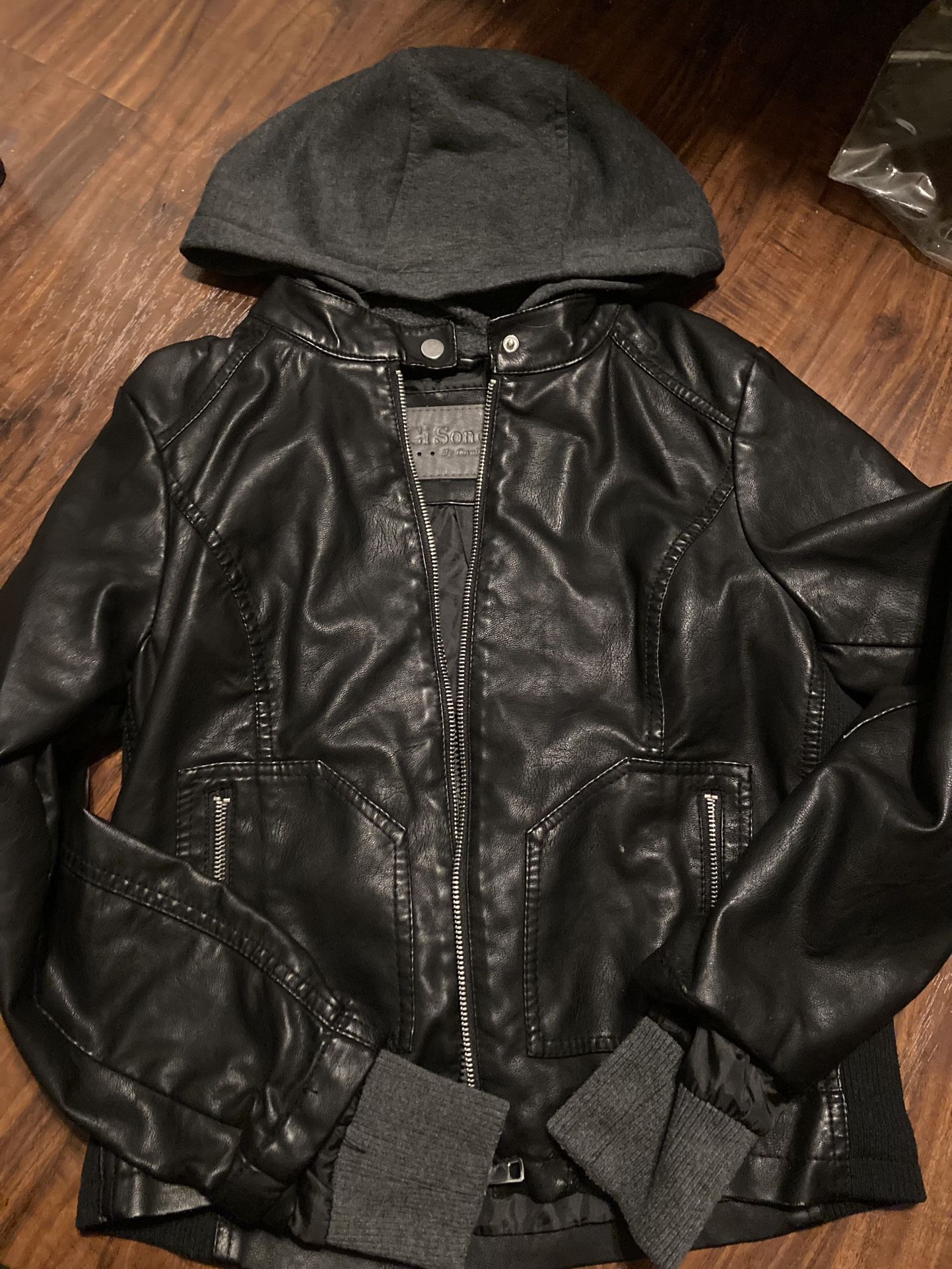 size medium in women leather jacket with soft gray hoodie 