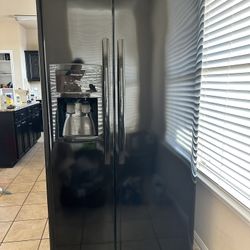 black frigidaire side by side refrigerator 