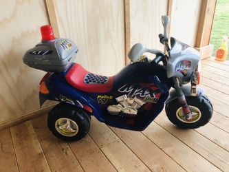 6 V police motorcycle brand new charger and battery