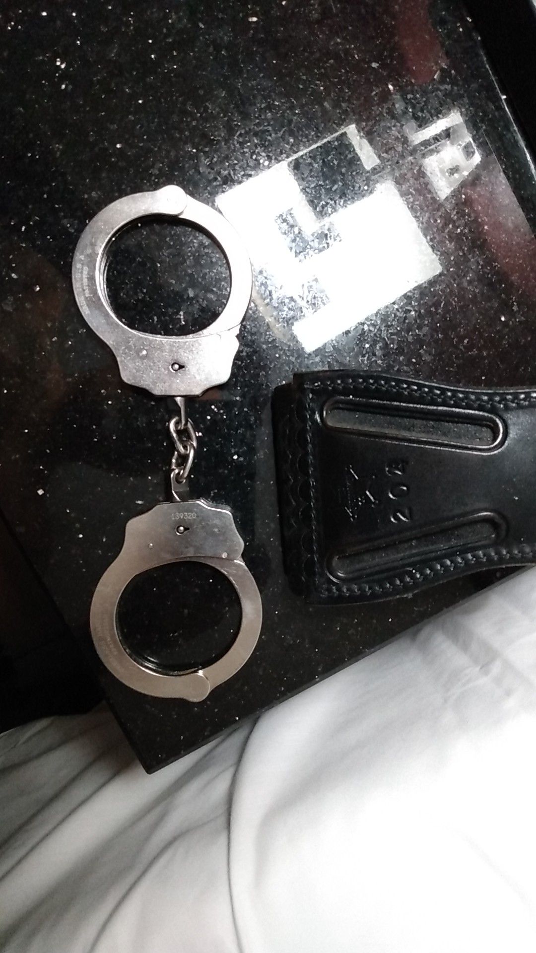 Handcuffs with blk leather case