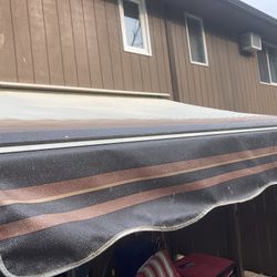 Sun Setter Motorized  Awning  Wall Mounted 12ft By 10ft 2in Coffee and Cream Stripe In Color With Weather Hood 