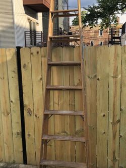 8 ’ wood ladder.