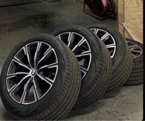 One set of BMW X5 wheels and tires