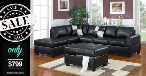 black sofa sectional with storage ottoman and pillows new
