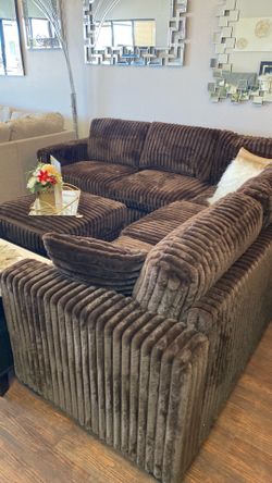 Brown sectional with ottoman