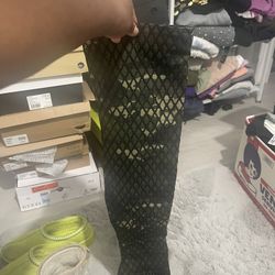 Thigh high army with fatigue, high heeled boots