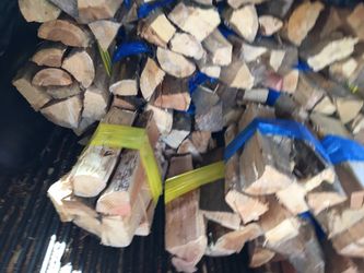 Bundles of dry-seasoned firewood (Ask about delivery)