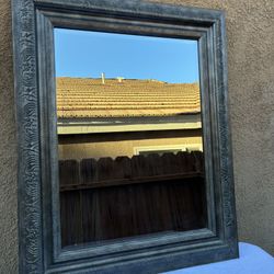 Large Framed Wall Mirror.                                         Dimensions 25 W x 31 H