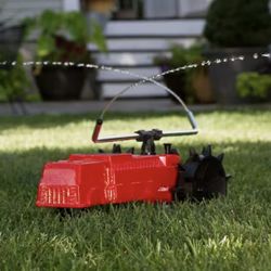 Traveling Yard Sprinkling System 