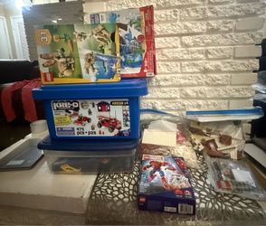 Lot of different open Legos with booklets and boxes
