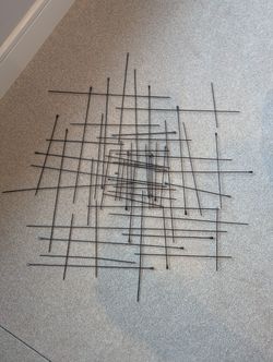Black Interlocking Metal Rods Wall Art Sculpture