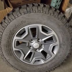 5 rims & tires for Rubicon 2014 - 4 rims with worn tires & 1 brand new rim & tire