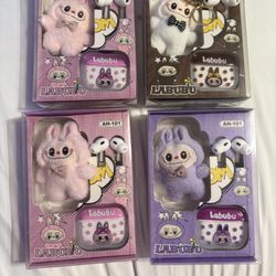 Labubu headphones with plush toy