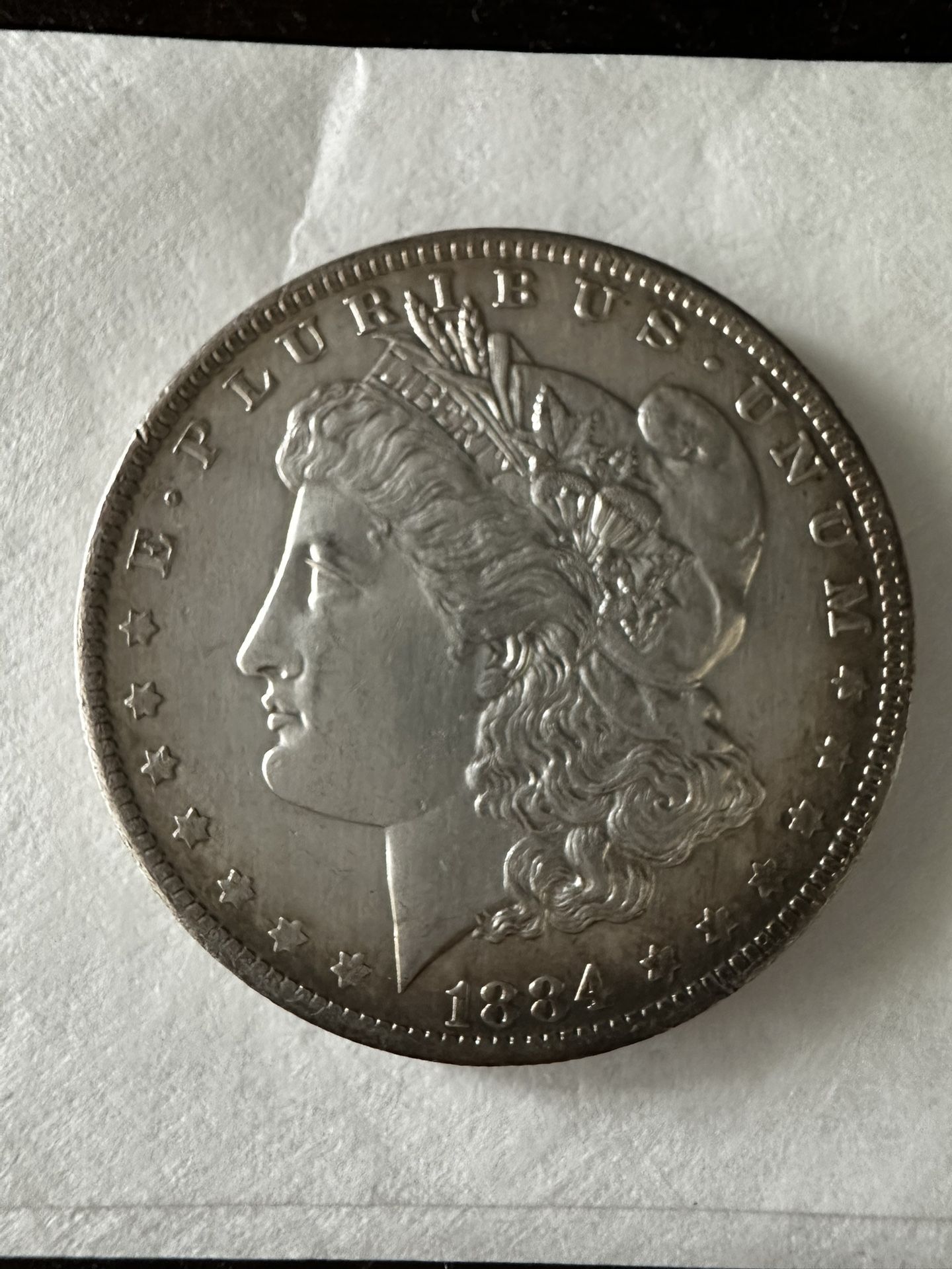 1884 Morgan Silver Dollar.