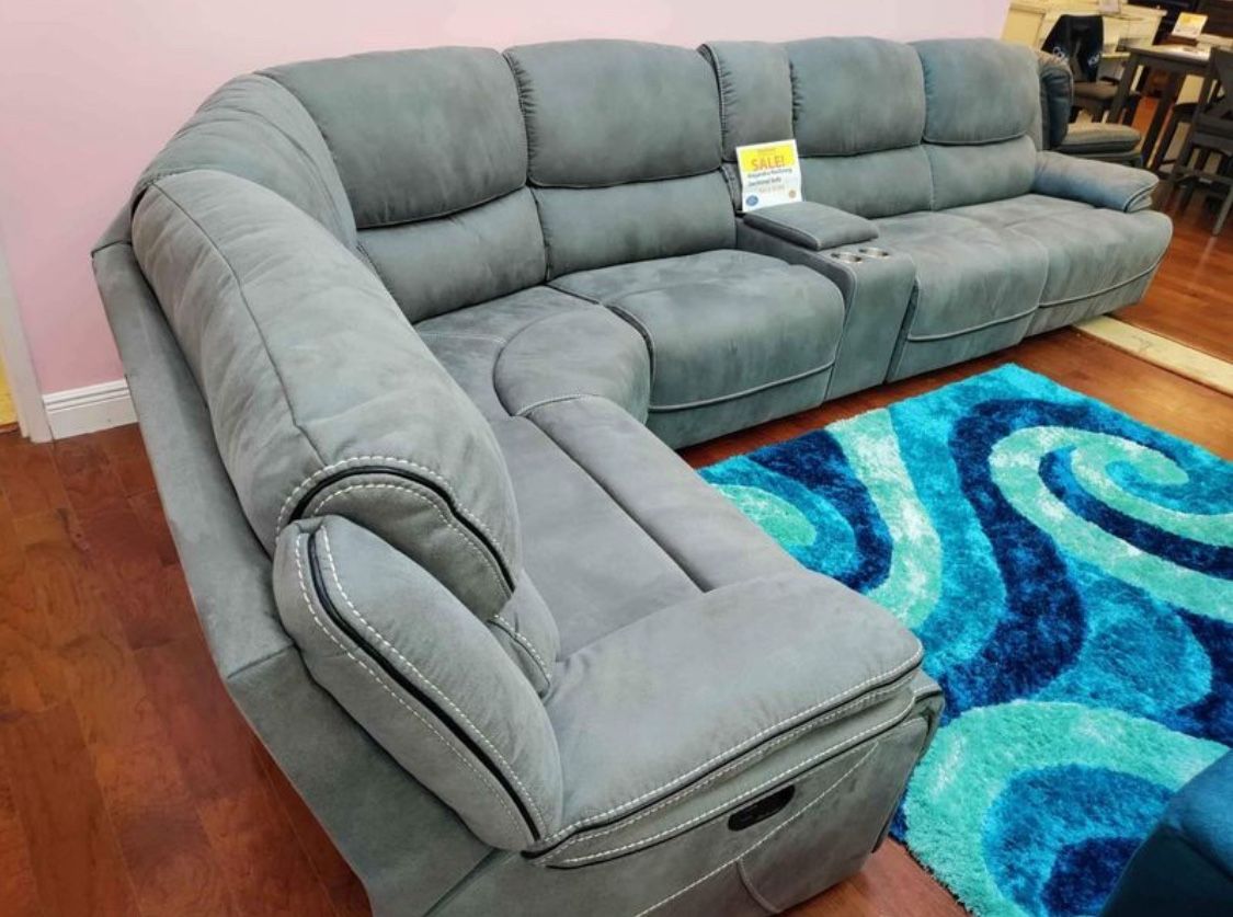Going out of business sale. Alejandra gray reclining sectional now $1599. Easy finance option. Same-day delivery.