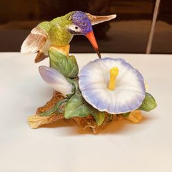 Vintage porcelain hummingbird in flight with flower figurine