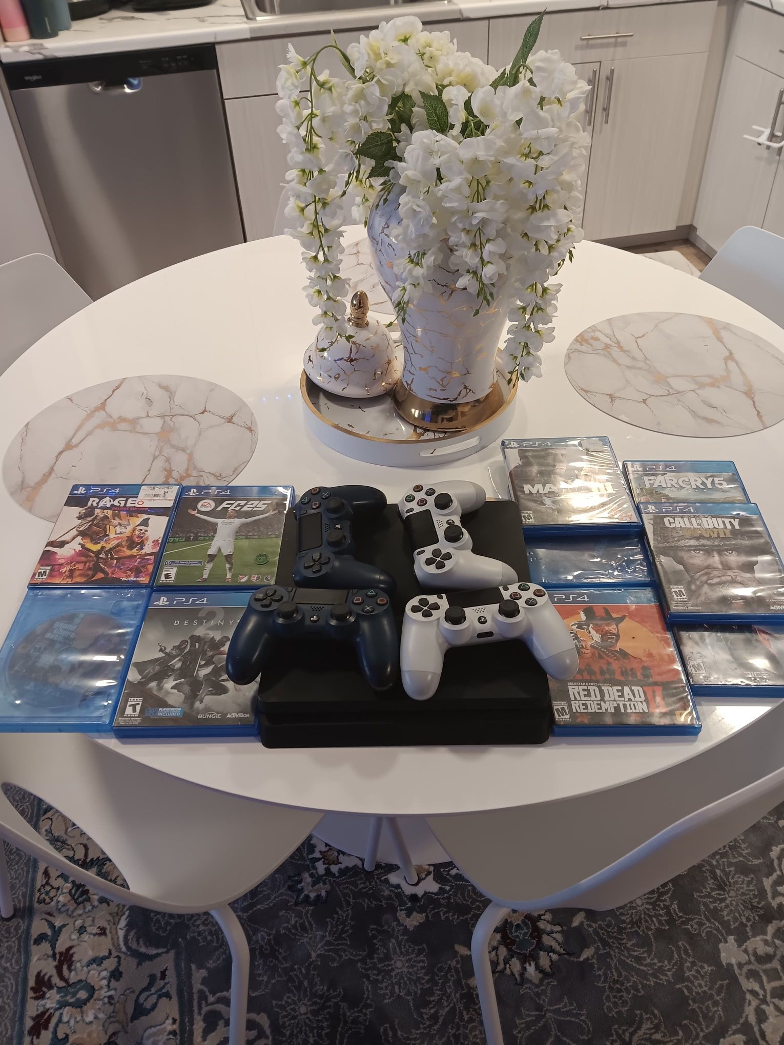 PS4 With Controllers And Games 