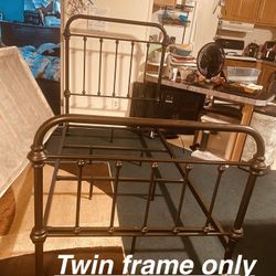 $160-lightweight metal twin size bedframe- does not come with any mattress or boxspring.  I do have mattresses for sale if interested please message m