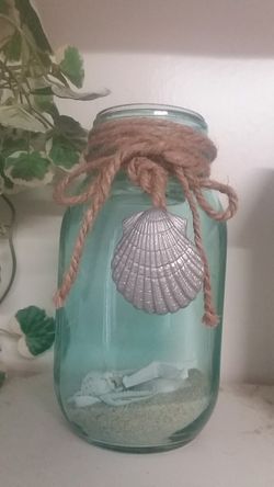 CANDLE HOLDER ON TOP (NEVER USED) WITH NAUTICAL SHELLS AND SAND WITH ROPE.