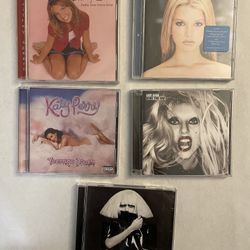 5 CDs - Britney Spears, Lady Gaga, Jessica Simpson, and Katy Perry