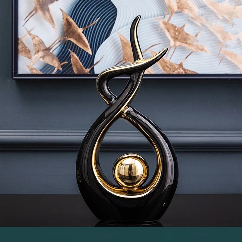 Abstract Figurines & Sculptures.   Size: 12.2" H x 6.29" W x 2.36" D