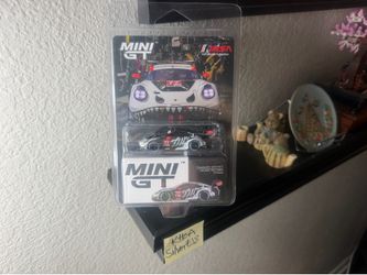 MINI GT 1:64 Porsche 911 GT3 R #77 AO Racing 2025 IMSA Petit Le Mans Skeleton Skelly