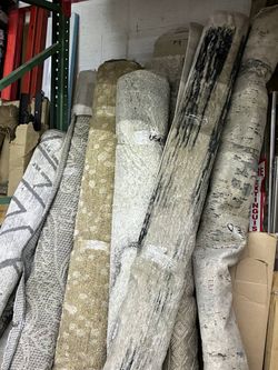 Lot of Rolled Area Rugs Mixed Styles used $10
