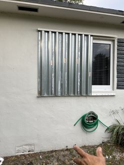 Hurricane shutters