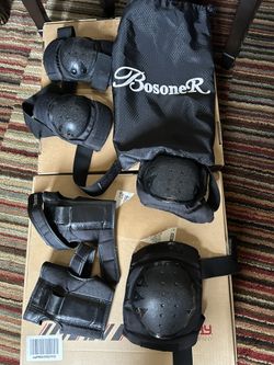 2 sets of knee pads, elbow pads, and wrist guards.