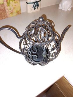 Metal teapot decor