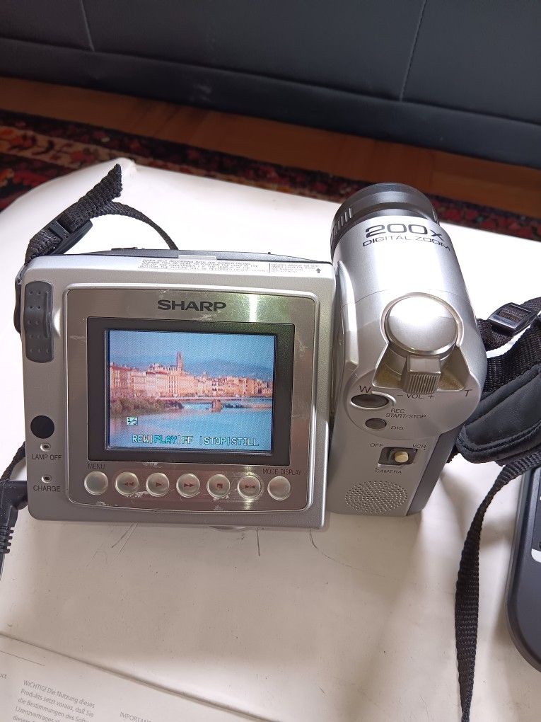 Sharp camcorder with 200x digital zoom. With Remote And Case