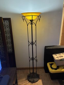 tall antique style lamp, metal based 