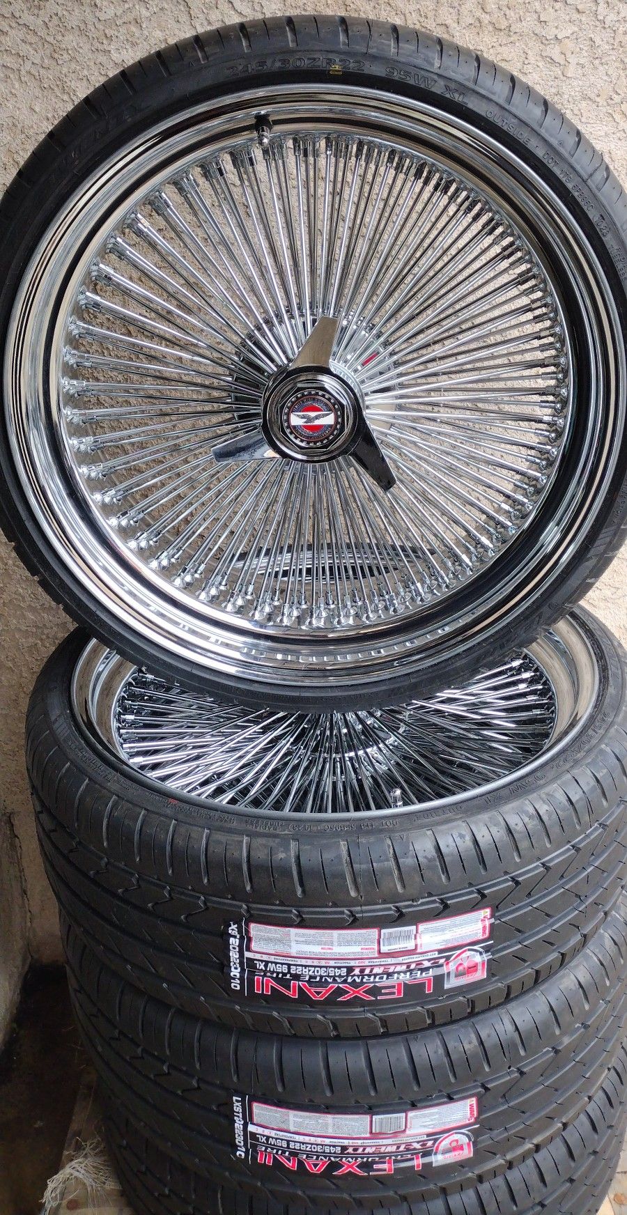 BRAND NEW WIRE WHEELS AND TIRES 22"s