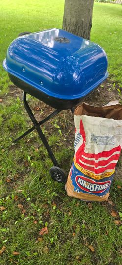 Americana foldable grill 20x20  plus 12 pounds of charcoal
