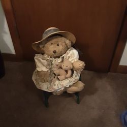 Mother Teddy Bear With A Hat Holding Baby Teddy Bear