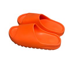 Adidas Yeezy Slide in the "Enflame Orange" Colorway