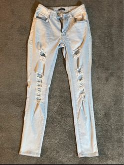 Light Wash Distressed Skinny Jeans
