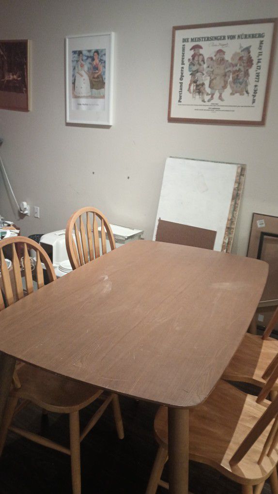 Table and four wooden chairs 