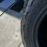 Like new tire 1  325 60 18