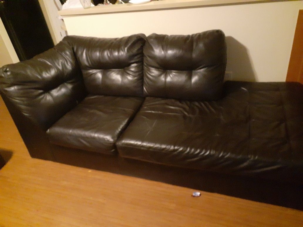 Two piece sectional with table