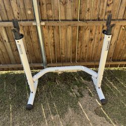 Squat Rack And (2) 35 Lb Weights 