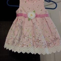 5 baby girl dresses, and 2 snap on short type