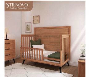 Wooden toddler bed with mattress