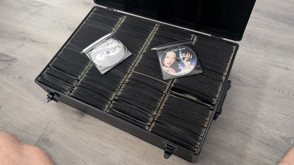 Almost 1000 DVDs In Organized Case!