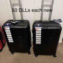 Suitcase new 50  Dlls each