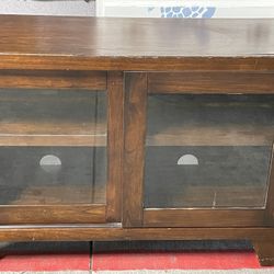 42” Wood Cabinet With shelves And Two  sliding glass doors