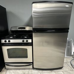 Whirlpool top freezer refrigerator &. GE gas range como stainless steel 